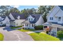 View of a charming neighborhood showcasing well-maintained lawns and inviting home exteriors at 1676 Citadel Ln., Myrtle Beach, SC 29577