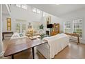 Spacious living area with soaring ceilings, ample natural light, and views of the manicured outdoor spaces at 214 Sea Island Dr., Georgetown, SC 29440