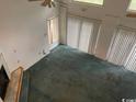 View of living room with fireplace and sliding glass doors at 2862 Loblolly Ave., Little River, SC 29566