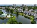 Scenic aerial view of condos, a pool, and a waterway; highlighting the community's beauty at 601 Hillside Dr. N # 3704, North Myrtle Beach, SC 29582