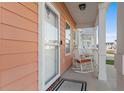 Relaxing front porch showcasing rocking chairs, adding to the home's welcoming curb appeal at 603 Wave Rider Ln. # 603, North Myrtle Beach, SC 29582