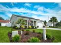 Beautifully landscaped yard complements this well-maintained single-Gathering home at 9675 Holladay Dr., Murrells Inlet, SC 29576