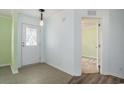 Inviting entryway with decorative glass door, tile flooring, and neutral paint at 1001 Greencrest Ct., Conway, SC 29526