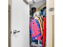 Storage closet filled with cleaning supplies and watersport equipment at 2501 S Ocean Blvd. # 111, Myrtle Beach, SC 29577