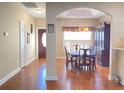 Elegant dining area featuring wood floors, ample lighting, and space for a large table at 348 Basswood Ct., Conway, SC 29526