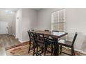 Cozy dining area with modern table and seating, perfect for Gathering meals and gatherings at 1560 Swing Bridge Way, Myrtle Beach, SC 29588