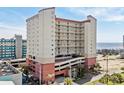 Gorgeous multi-story condo with ocean views, balcony access, and covered parking at 1706 Perrin Dr. # 401, North Myrtle Beach, SC 29582