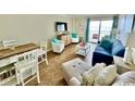 Charming living room with ocean views, a dining area, and comfortable seating at 2001 S Ocean Blvd. # 303, Myrtle Beach, SC 29577