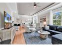 Bright living room featuring stylish furnishings, a ceiling fan, and an abundance of natural light at 35 Delray Dr. # 3A, Murrells Inlet, SC 29576