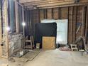 Renovated living room with exposed brick, new flooring, and natural light at 1403 9Th Ave., Conway, SC 29526