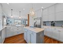 Spacious open kitchen with center island, stainless appliances, and seamless access to the dining area at 1705 N Ocean Blvd. N, North Myrtle Beach, SC 29582