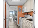 Bright kitchen leading to dining area with ocean views, features modern appliances at 2801 S Ocean Blvd. # 835, North Myrtle Beach, SC 29582