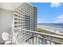 Relaxing ocean view from a private balcony overlooking the beach and pool area at 300 N Ocean Blvd. # 723, North Myrtle Beach, SC 29582