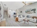 Bright and airy living room featuring hardwood floors and an open-concept design at 3477 Bristol Ln. # 3477, Myrtle Beach, SC 29577