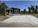 Well-maintained, single story home with a large concrete parking pad and plenty of parking space at 401 Cessna St, Myrtle Beach, SC 29577