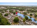 Beautiful aerial view of a condo community with a waterfront and mature trees at 4387 Daphne Ln. # B, Murrells Inlet, SC 29576