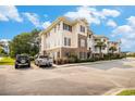 Condo complex exterior shows brick, siding, landscaping and parking at 730 Pickering Dr. # 303, Murrells Inlet, SC 29576