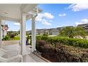 Inviting front porch with white columns and a view of the neighborhood at 765 Berkshire Ave., Myrtle Beach, SC 29577