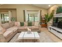 Cozy living room featuring a comfortable sectional sofa, stylish decor, and a bright, airy atmosphere at 108 Pipers Ln. # 108, Myrtle Beach, SC 29575