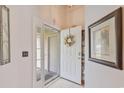 Bright entryway with decorative wreath, leading into the main house at 1407 Sunningdale Ln., Myrtle Beach, SC 29588