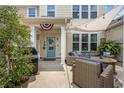 Inviting outdoor patio area with stylish furniture, grill, and decorative lighting at 2504 Heritage Loop # 2504, Myrtle Beach, SC 29577