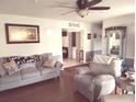 Inviting living room with stylish furniture, wood floors, and ample space for relaxation at 4083 Sand Trap Ave., Little River, SC 29566