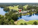 Aerial view of property, highlighting its location near water, the golf course, and community at 117 Pinehurst Ln. # 5-J, Pawleys Island, SC 29585