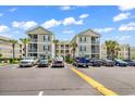 Inviting condominiums featuring multiple stories, balconies, and convenient parking at 2020 Cross Gate Blvd. # 203, Surfside Beach, SC 29575