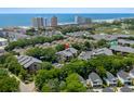 Aerial view of the condo complex, showcasing its proximity to the beach and surrounding neighborhood at 223 Maison Dr. # B-8, Myrtle Beach, SC 29572