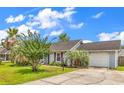 Exterior of home with driveway and attached garage at 405 Flagstone Dr., Myrtle Beach, SC 29588
