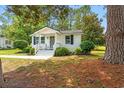 Adorable single-story home with a classic design and green landscaping at 1004 Georgetown St., Marion, SC 29571