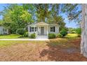 Cozy one-story home with landscaped front yard and walkway at 1004 Georgetown St., Marion, SC 29571