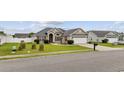 Single-story home featuring well-kept lawn and an attached two-car garage at 1205 Cymmer Ct., Conway, SC 29527