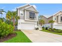 Attractive home showcasing a well-manicured lawn and two-car garage at 277 Splendor Circle, Murrells Inlet, SC 29576