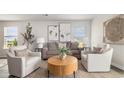 Cozy living room featuring a large sectional sofa, two chairs, and stylish decor at 3579 Ashridge Way, Conway, SC 29526