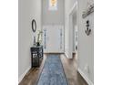 Elegant foyer with soaring ceiling and light, showcasing a stylish decor at 446 Rycola Circle, Surfside Beach, SC 29575