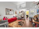 Spacious living room with soaring ceilings, hardwood floors and neutral paint at 701 Wilshire Ln. # 0, Murrells Inlet, SC 29576