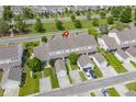 Aerial view showcases the property's backyard, detached garages, and proximity to neighboring homes at 816 Barn Owl Ct. # 816, Myrtle Beach, SC 29579
