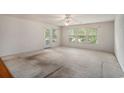 Bedroom features natural lighting, ceiling fan, and access to outside at 9 Pistachio Loop # D, Murrells Inlet, SC 29576