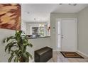 Open concept entryway with tiled floors leading to dining area at 97 Shadow Moss Pl. # 97, North Myrtle Beach, SC 29582