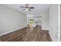 View of an open concept living room with sleek floors and a ceiling fan at 104 Browns Hollow Ct., Loris, SC 29569