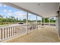 View from the porch, highlighting its spacious design, overlooking the surrounding landscape and construction area at 1321 Rabbit Ln., Conway, SC 29526