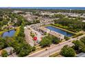 Breathtaking aerial view of the condo community, showcasing nearby pond and the beautiful blue ocean at 1356 Glenns Bay Rd. # A202, Surfside Beach, SC 29575