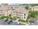 Aerial view of a condo complex featuring lush landscaping and convenient parking at 1900 Duffy St. # L4, North Myrtle Beach, SC 29582