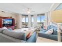 Cozy living room with ocean view, comfortable seating and nautical decor at 341 South Dunes Dr. # C-34, Pawleys Island, SC 29585