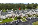 Beautiful aerial view of townhouses with mature trees, green lawns and on-site parking at 3833 Myrtle Pointe Dr. # 18 Bu 3, Myrtle Beach, SC 29577