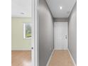 Well-lit entryway with neutral paint, tile flooring, and a view into an adjacent living space at 4101 Pinehurst Circle # Aa-3, Little River, SC 29566