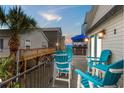Relax on this inviting balcony with ocean views and comfortable seating, perfect for enjoying the coastal breeze at 6001 - 1082 S Kings Hwy., Myrtle Beach, SC 29575