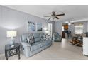 Cozy living room with comfortable seating and bright, beach-themed decor at 6001-1808 S Kings Hwy., Myrtle Beach, SC 29575
