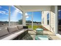 Relaxing screened porch with comfortable seating and outdoor views at 7139 Shooting Star Way, Myrtle Beach, SC 29579